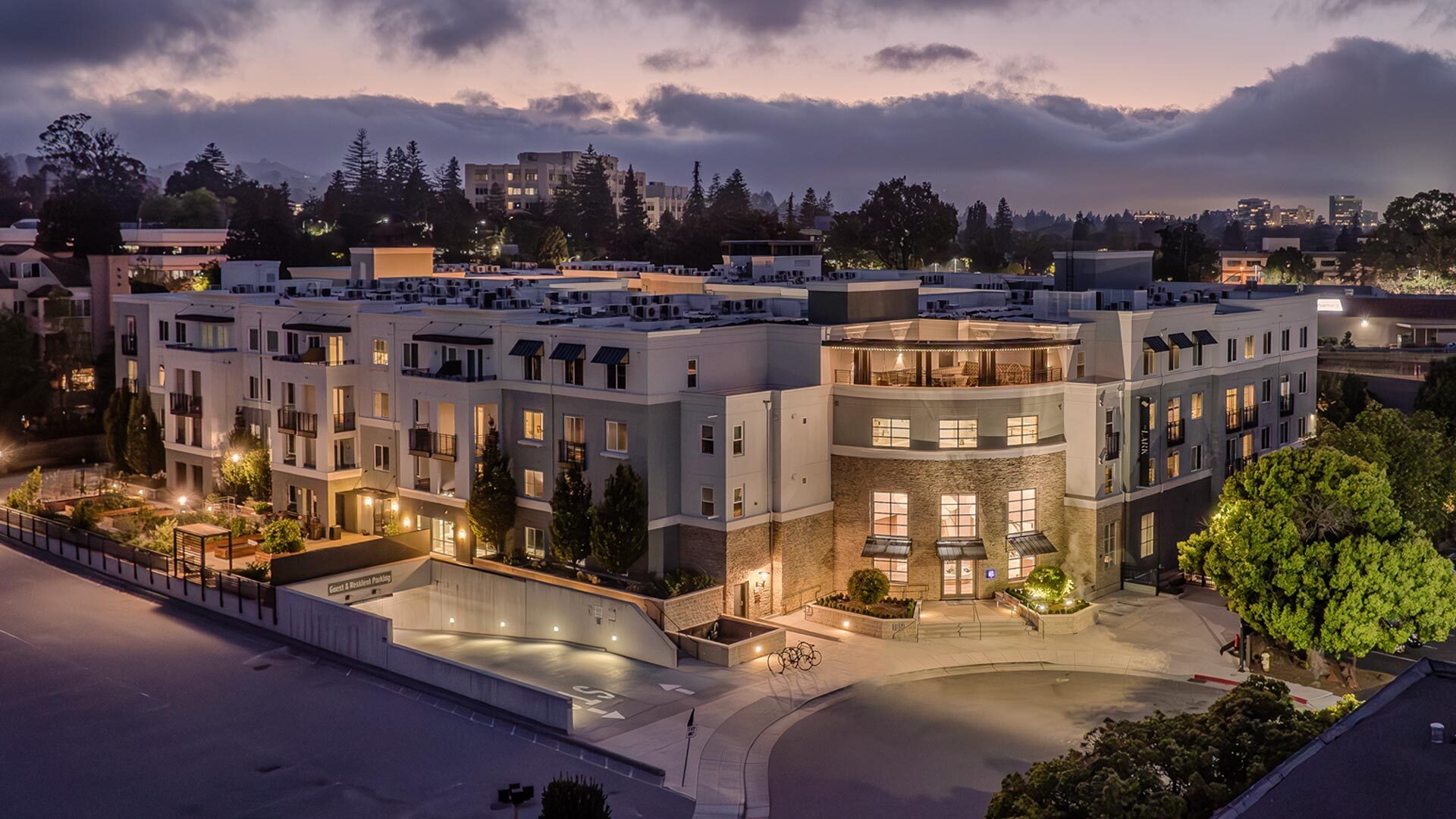 The lark san mateo exterior evening aerial view 2