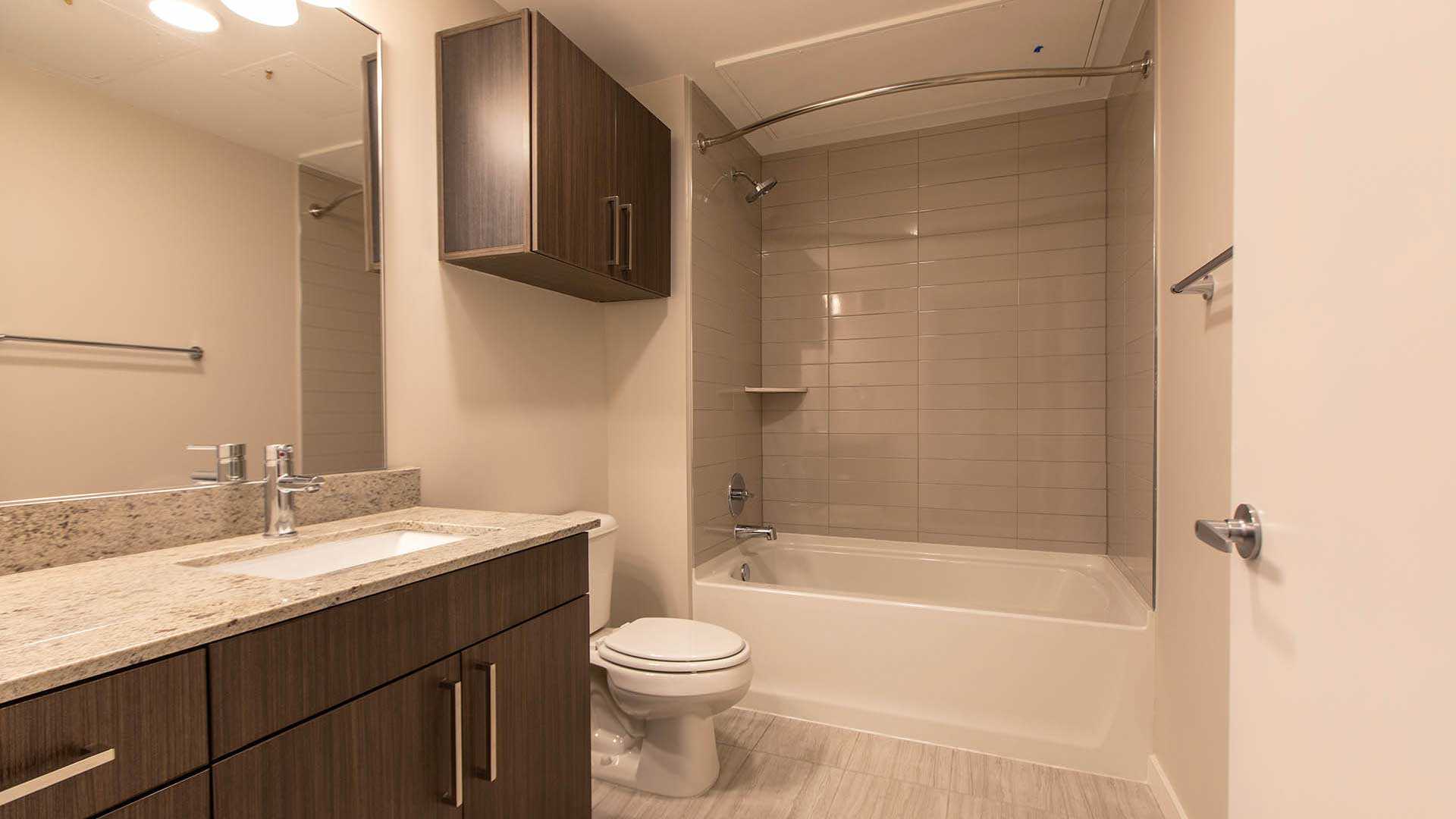 Reve apartments a1 bathroom warm decor view